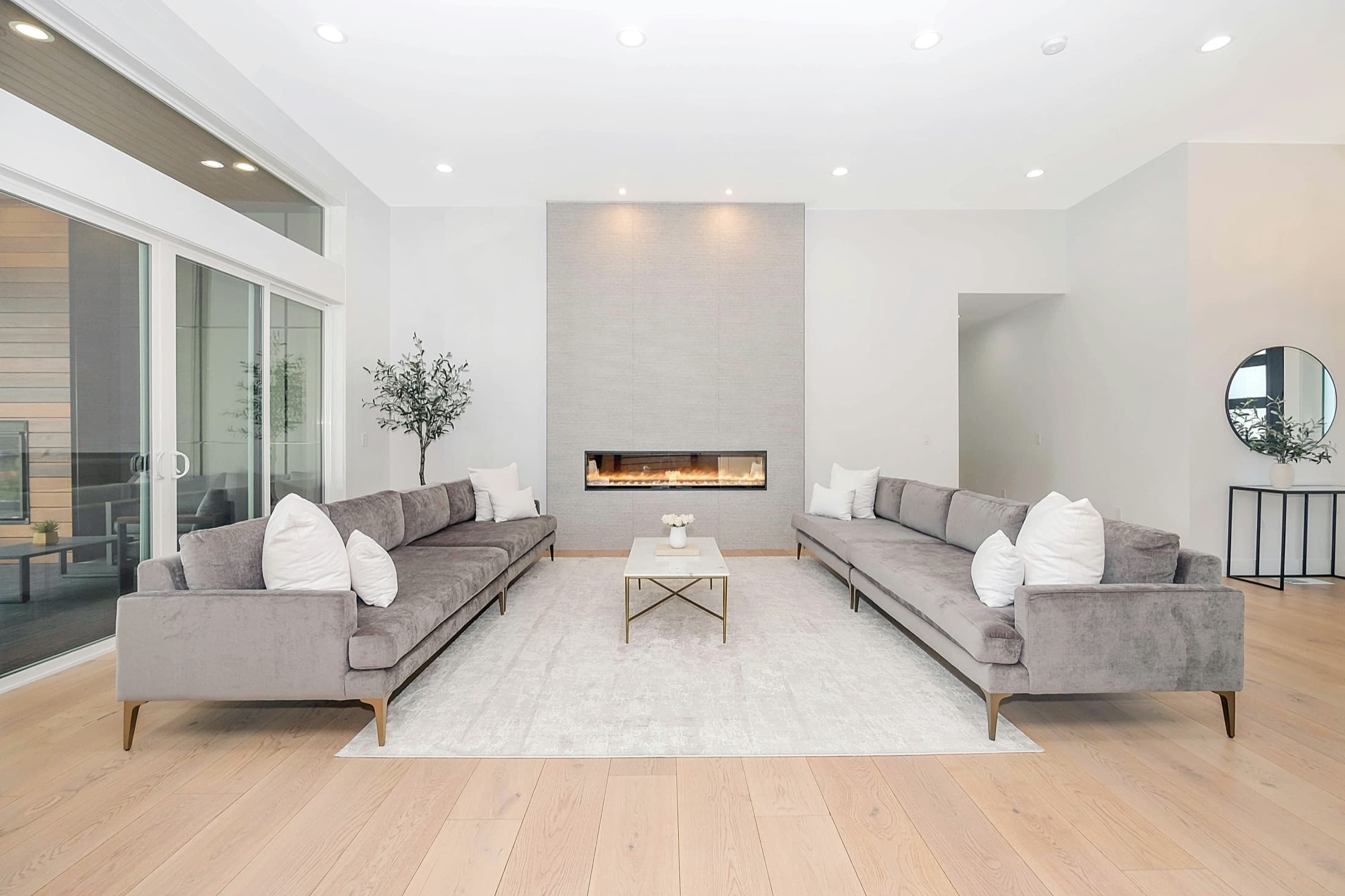 Staged living room prepared for market — composed, bright, and move-in ready